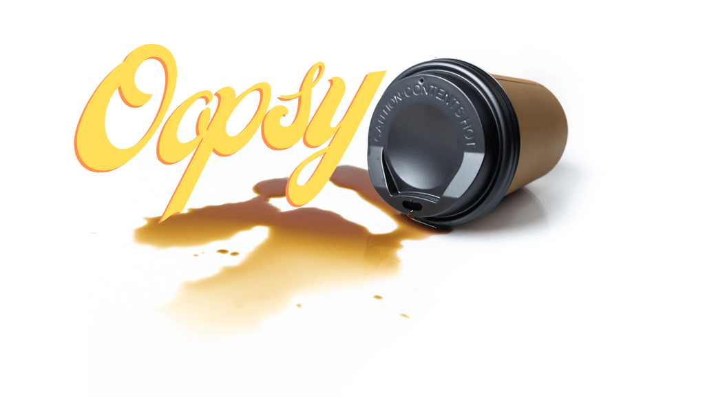 Spilled coffee cup on a white background and the word Oopsy