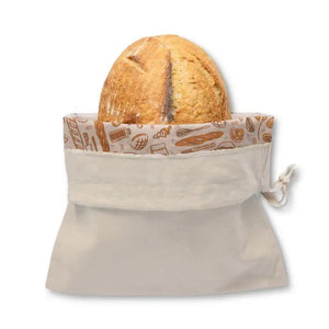 Fabric produce bag with a loaf of bread on a white background