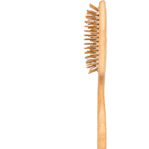 Wooden hairbrush on a white background