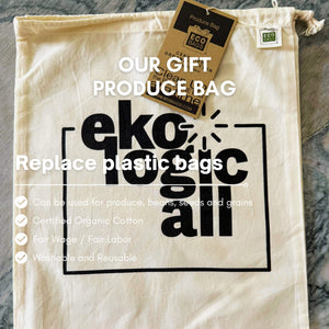 Ekologicall produce bag with text and tags on a marble surface
