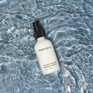 Rebrand sunscreen bottle on water