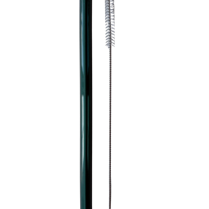 Green glass straw and cleaning brush on a white gray background