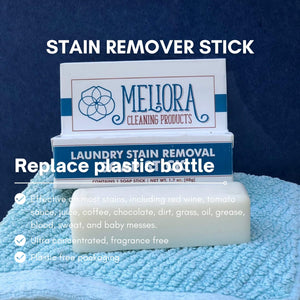 Meliora stain remover stick packaging on a blue towel with product details.