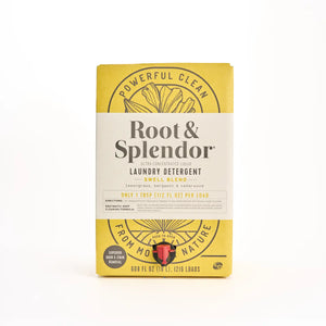 Root & Splendor Laundry Detergent Swell Blend in a yellow box with a white label, photographed on a clean white background.