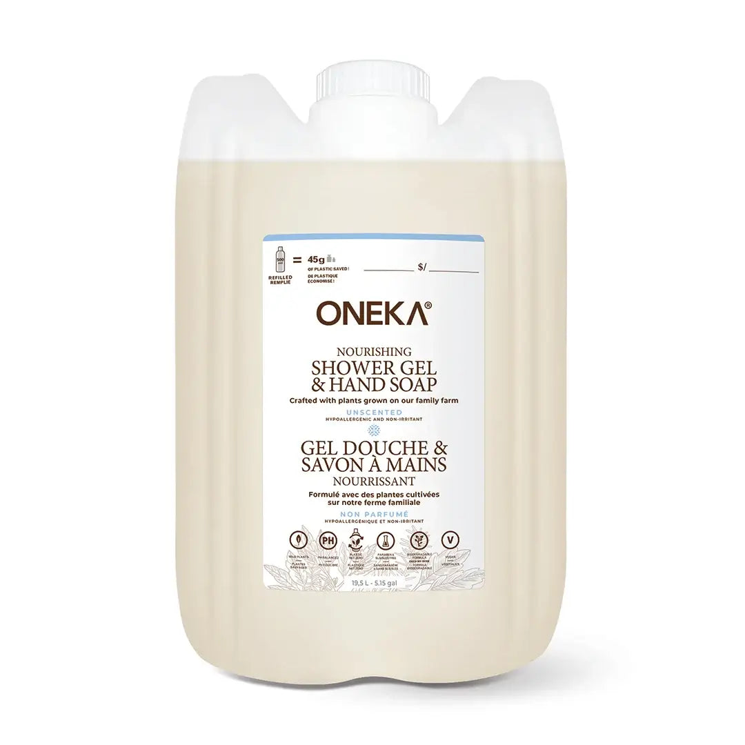 A large plastic jug of ONEKA Nourishing Shower Gel & Hand Soap, filled with a light beige liquid, on a clean white background.