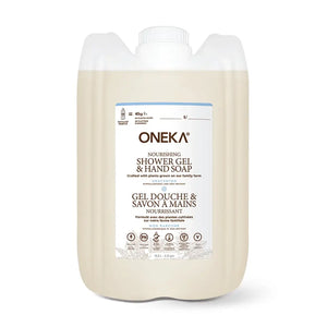 A large plastic jug of ONEKA Nourishing Shower Gel & Hand Soap, filled with a light beige liquid, on a clean white background.