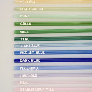 Color glass straws with labeled colors on a white background