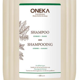 A refillable Oneka shampoo bottle with a label showing the brand name and the word 'Shampooing' in both English and French.